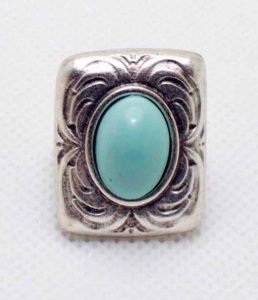 Turquoise ring.
