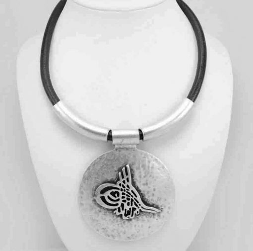 Disc symbol necklace