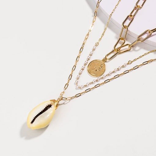 gold plated cowrie shell multi layer necklace
